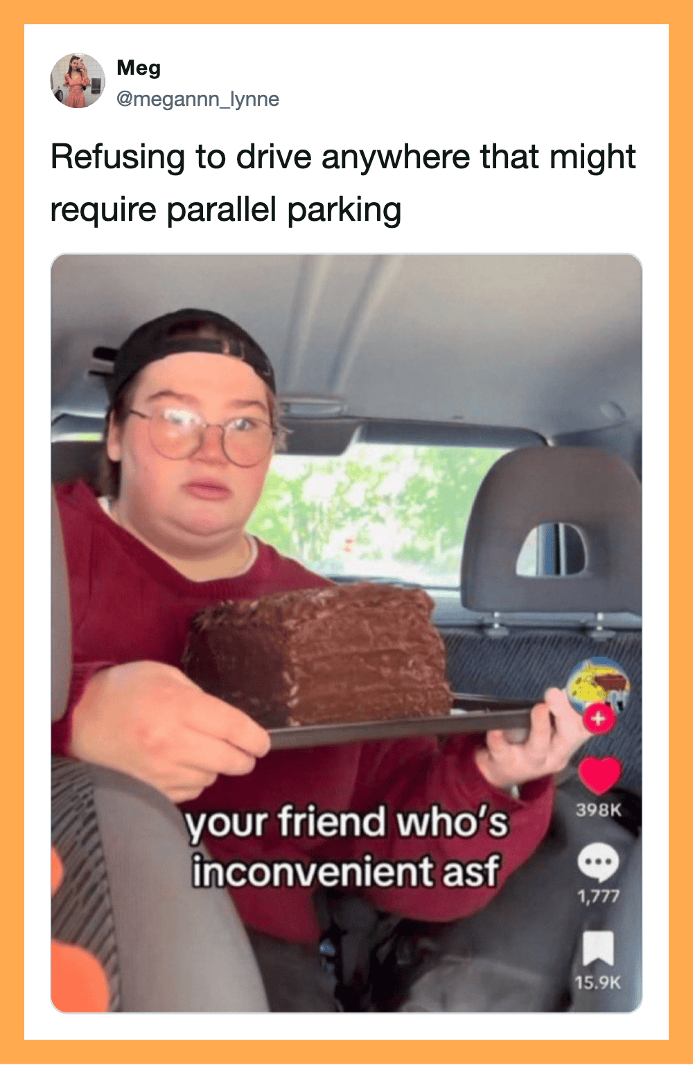 Person holding a tray with a large chocolate cake inside a car.