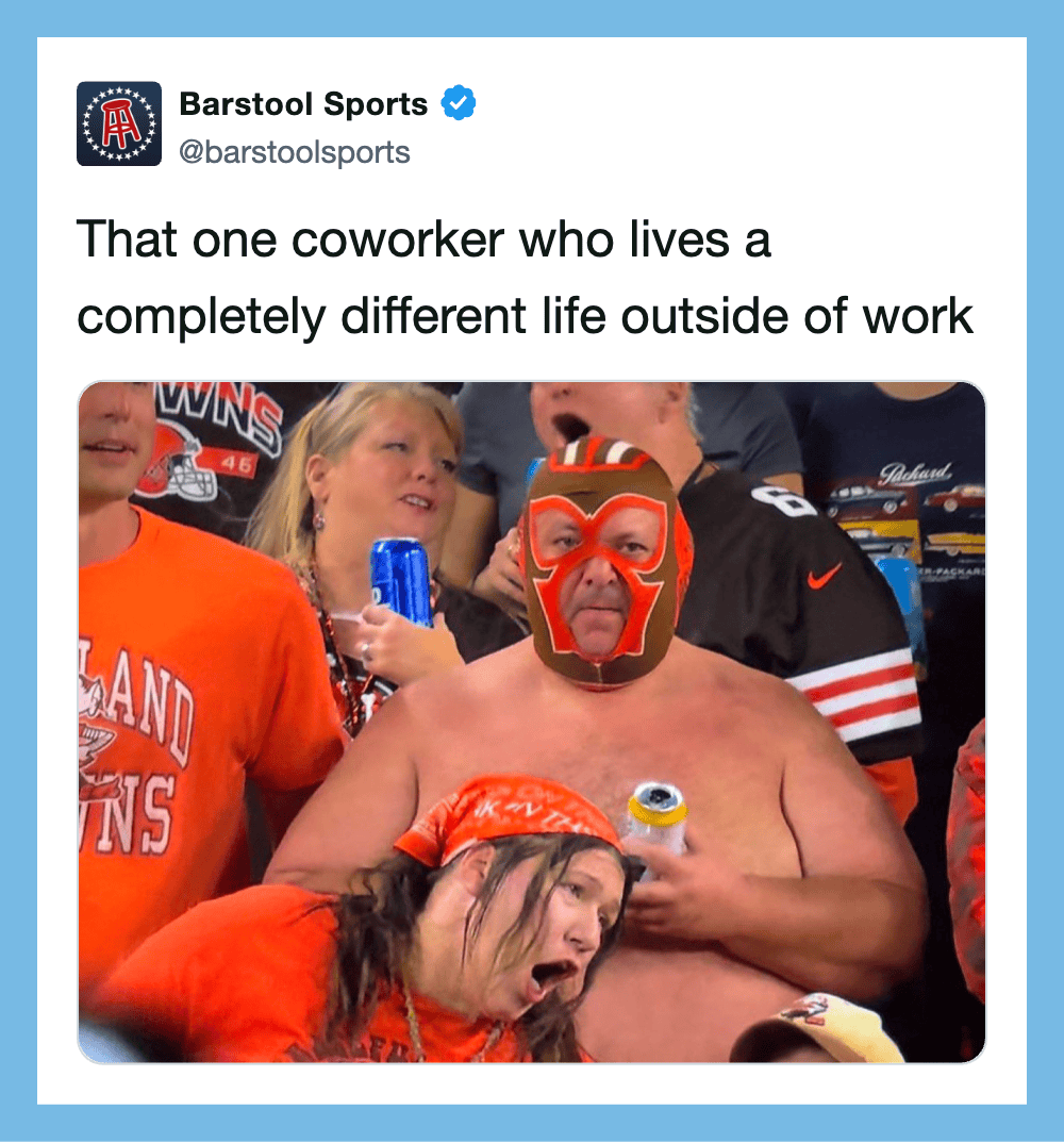 Group of fans at a sports event, one wearing a luchador mask, others in team gear.