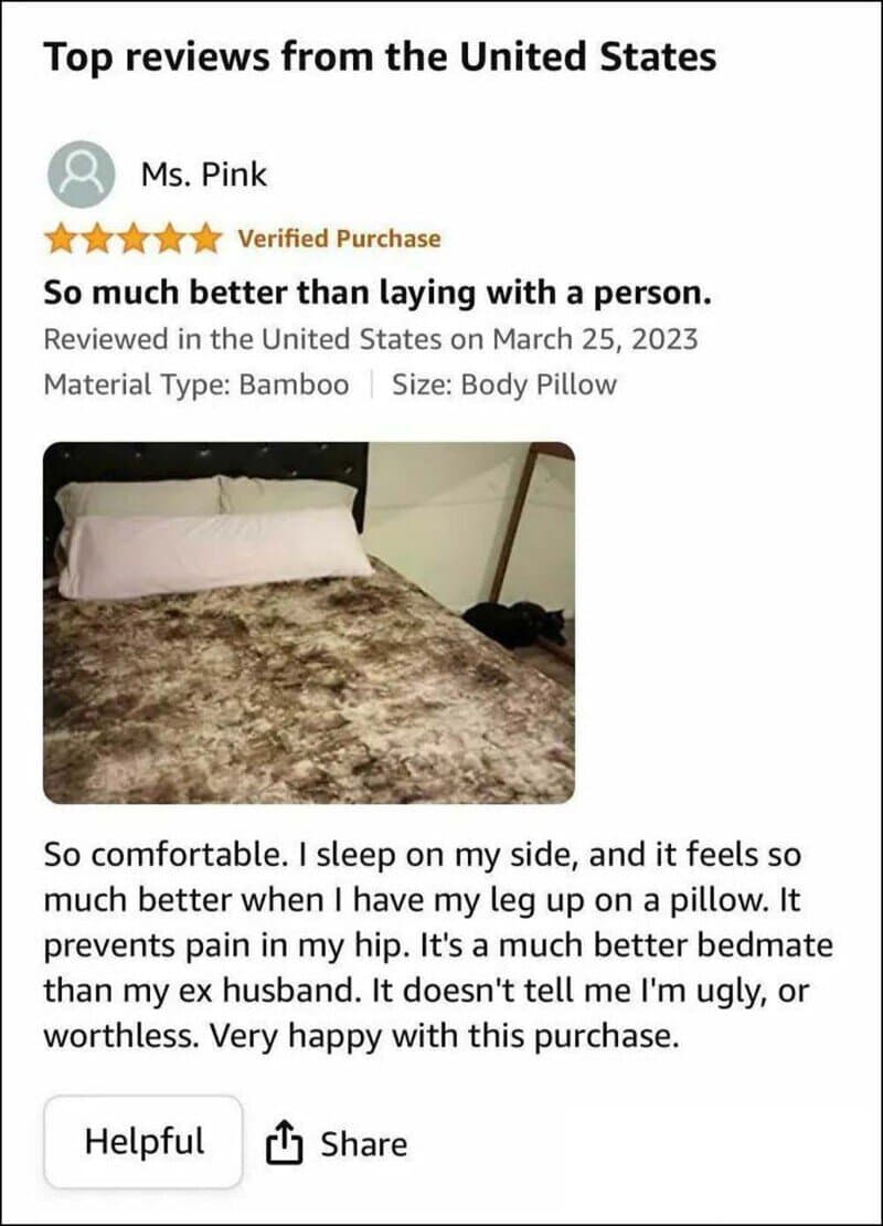 Review of bamboo body pillow with a photo of the pillow on a bed.