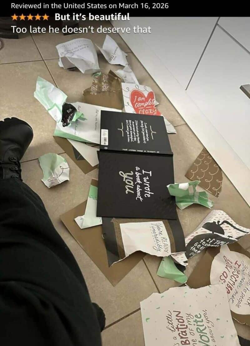 Messy kitchen floor with torn packaging and crumpled paper, review mentions it's beautiful but late.