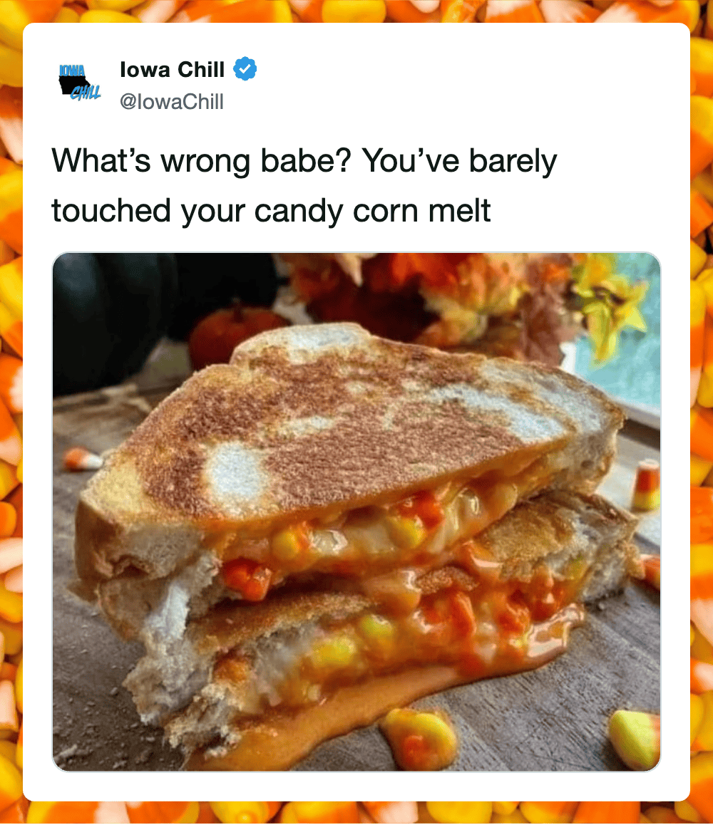 Close-up of a grilled cheese sandwich with melted candy corn spilling out.