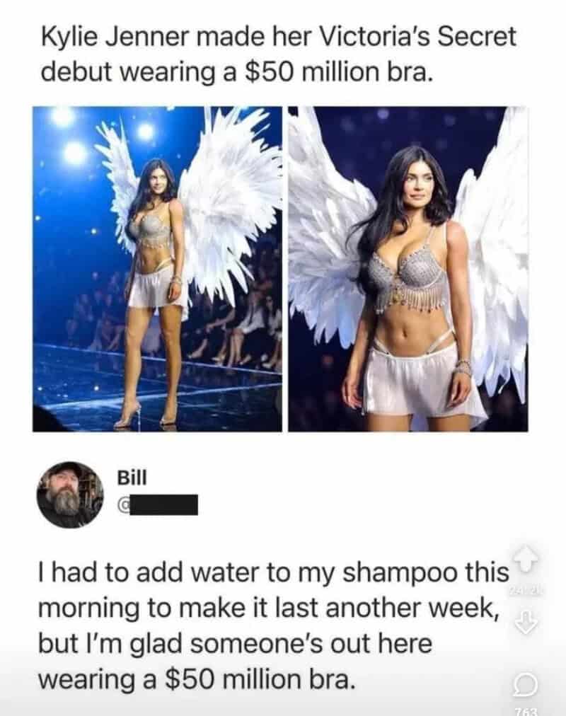 Kylie Jenner in Victoria's Secret debut with angel wings, wearing a silver bra and skirt.