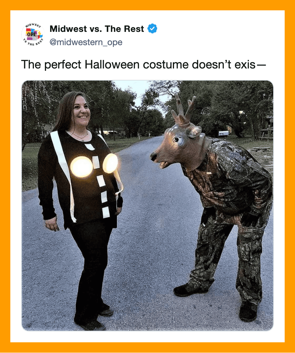 Woman in a black costume with lights and a person in a moose mask and camouflage outfit.