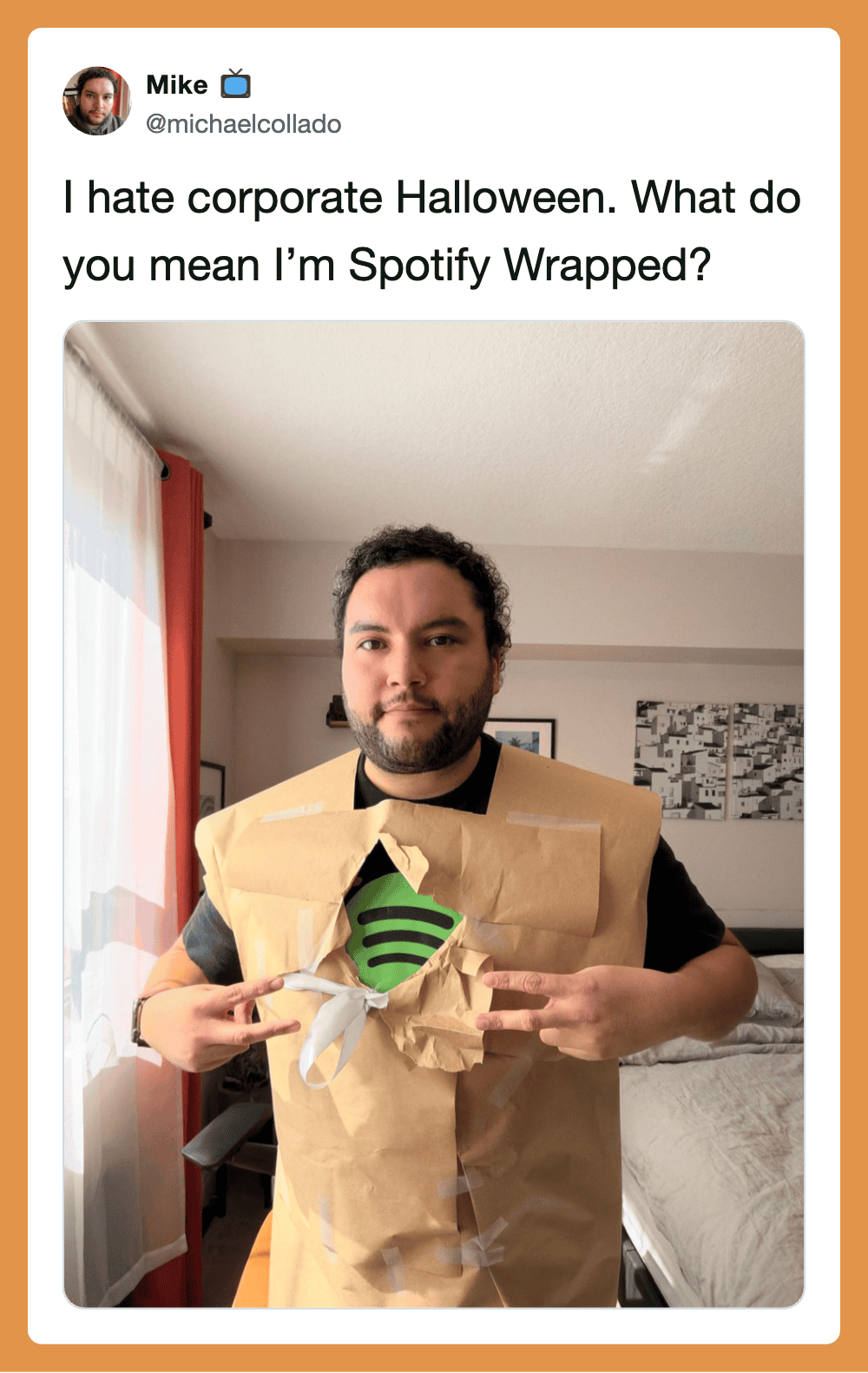 I hate corporate Halloween. What do you mean I’m Spotify Wrapped? man wearing a paper bag costume in.