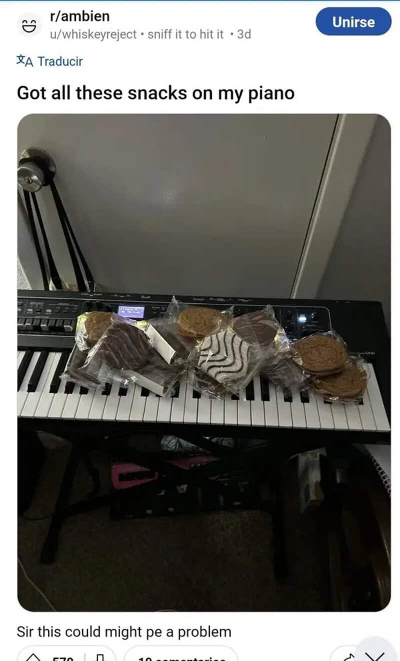 Snacks on a piano keyboard with a caption about a problem.
