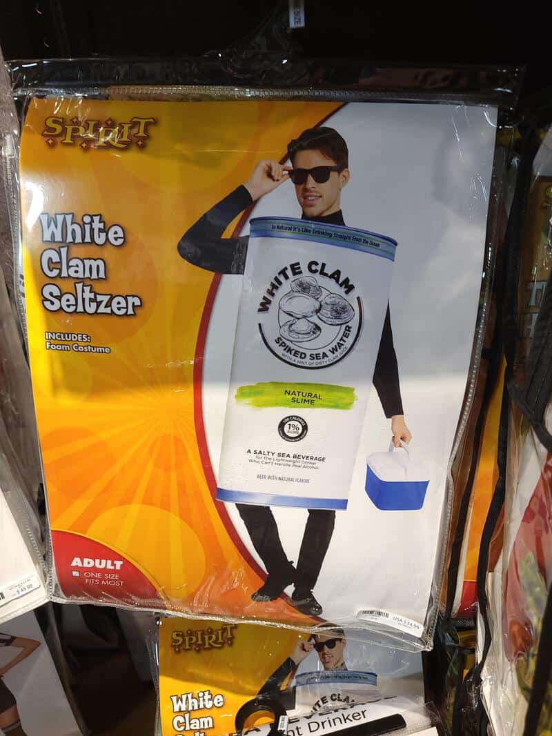 Man in black shirt and sunglasses holding a White Clam Seltzer bag.