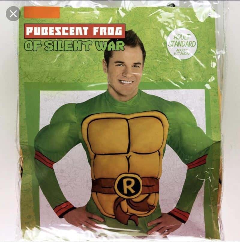 Green costume with a muscular chest and a brown belt with an 'R' on it.