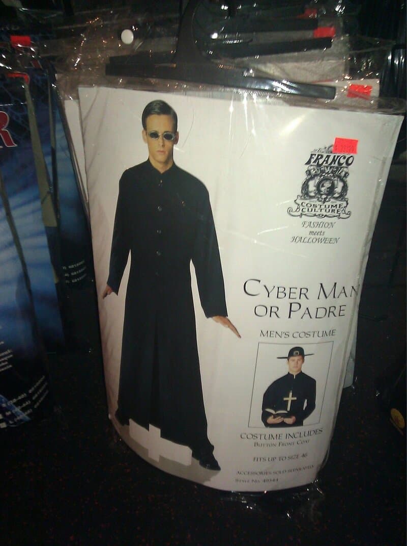 Cyber man or padre costume for men, includes long black coat and sunglasses.