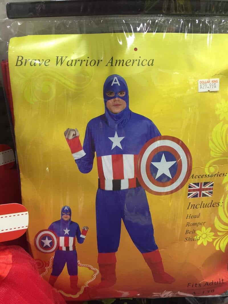 Child in Captain America costume with shield, headgear, and red boots, holding shield.