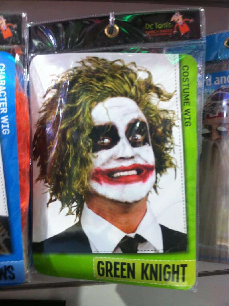 Green Knight costume with Joker face makeup in packaging.