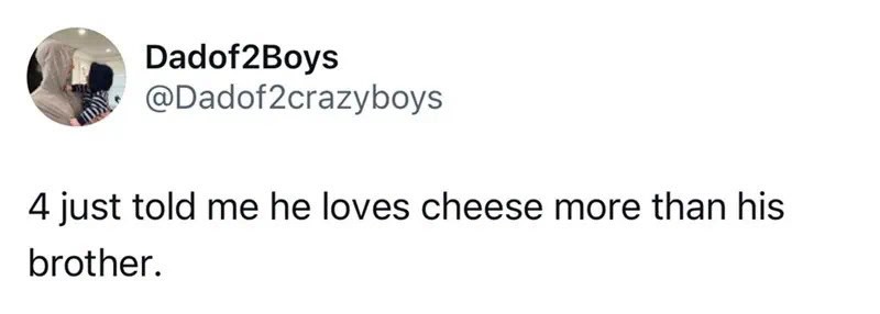 Child holding cheese with a caption about loving cheese more than his brother.