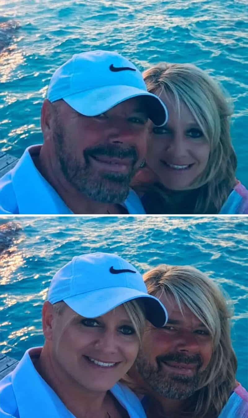 A man and woman smiling by the water, wearing blue Nike caps.