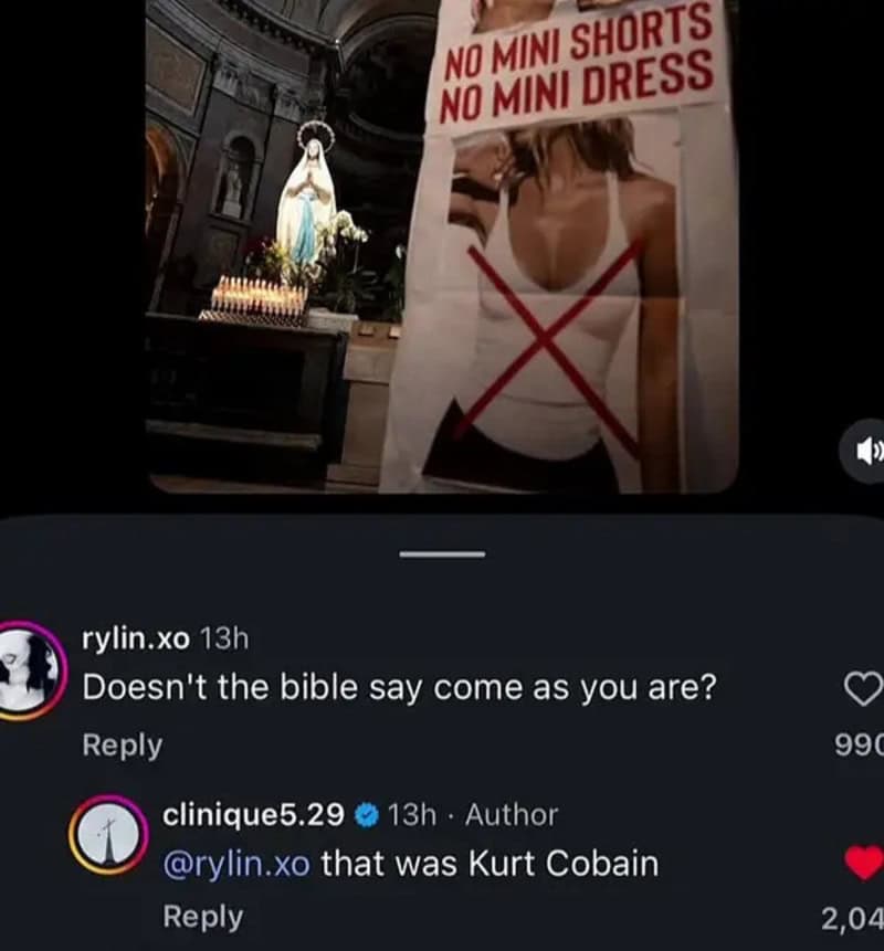 Sign says no mini shorts or mini dress, with a woman in a revealing outfit behind it.