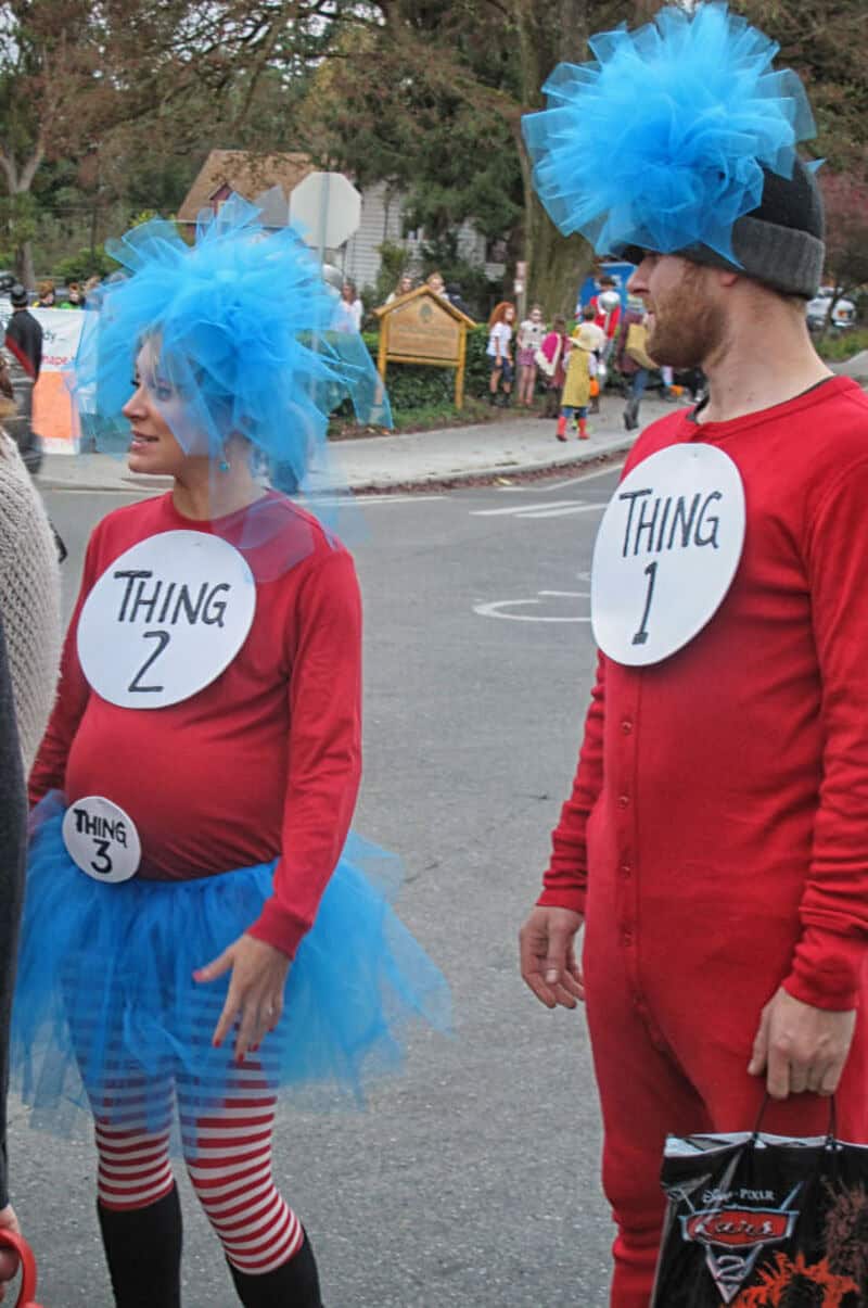 People dressed as Thing 2 and Thing 1 from Dr. Seuss at a Halloween event.