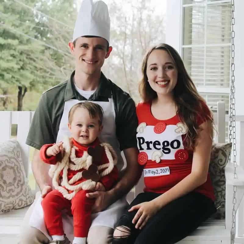 Family dressed as Prego pasta with a baby in a chef's hat and apron.