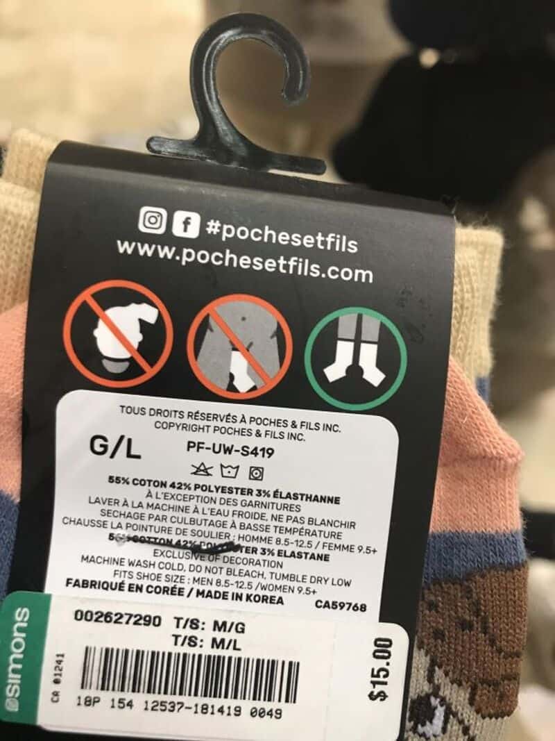 Clothing label with washing instructions and fabric details.