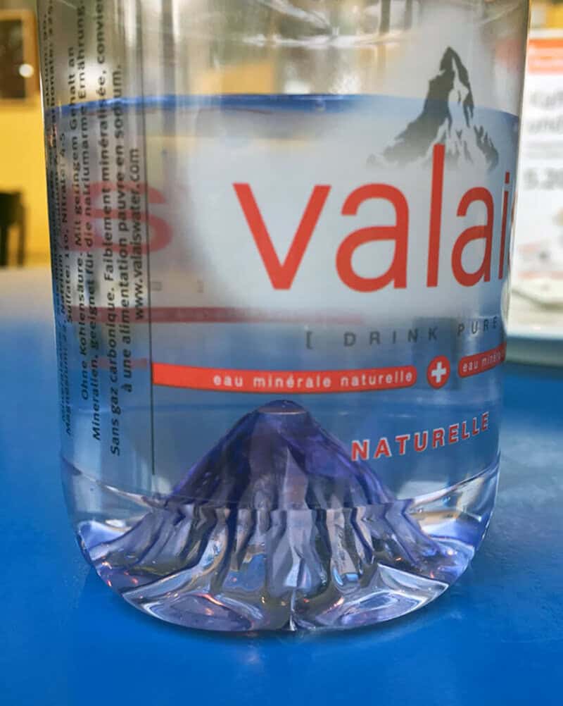 Valais water bottle with mountain and glacier image, natural mineral water.