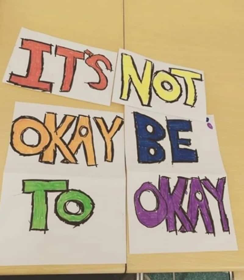 It's Not Okay To Okay It’s Not Okay To Okay - handwritten colorful letters on white cards arranged.
