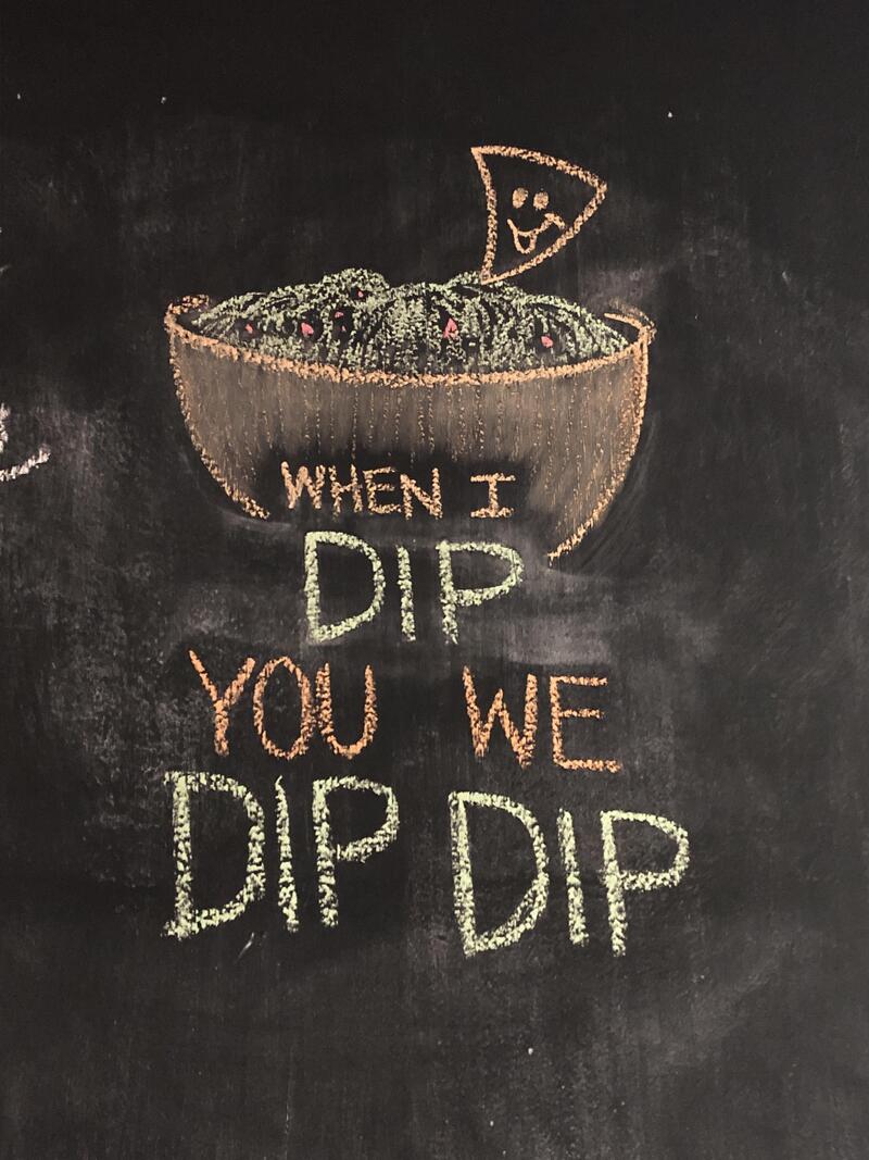 When I dip you we dip dip - chalk drawing on a chalkboard with a bowl and a slice.