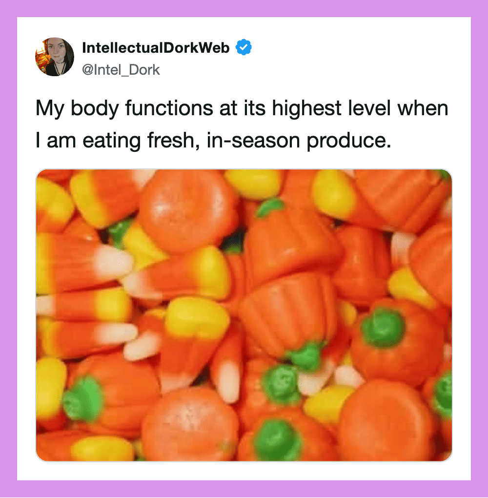 Colorful candy corn and pumpkin candies in a pile.