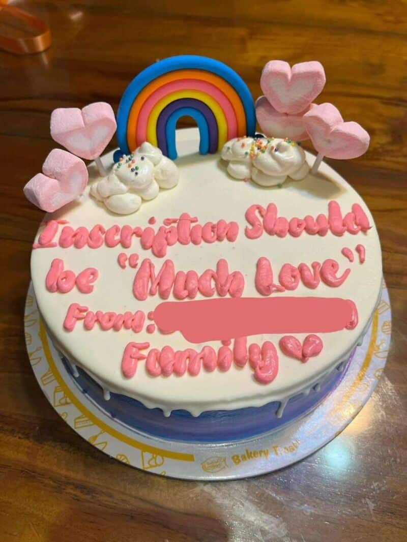 Hilarious Cake Fails: rainbow arch, pink hearts, white frosting with pink text.