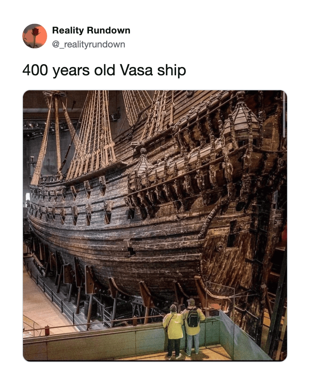 400 years old Vasa ship with two people in front for scale.