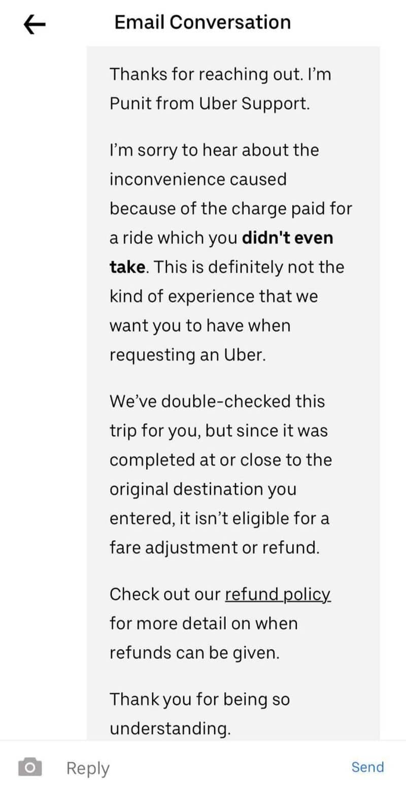 Uber support email reply explaining refund policy and trip details.