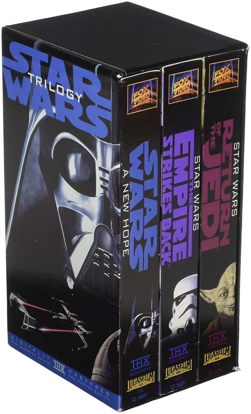 Star Wars Trilogy box set featuring Darth Vader helmet and colorful spine art.