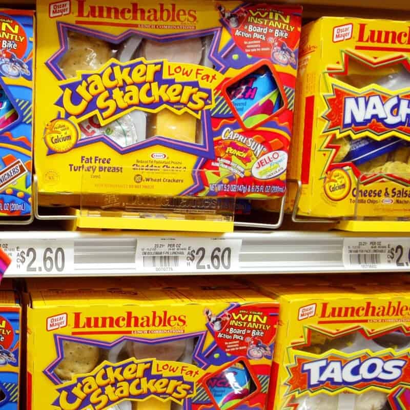 Cracker Stackers Lunab”, Lunchables display on grocery shelf with price tag $2.60.