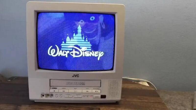 Vintage JVC CRT TV displaying Walt Disney castle logo.