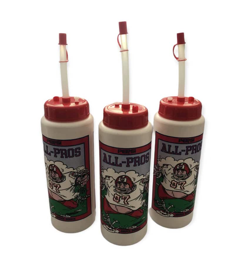 Three white plastic bottles with red lids labeled ALL-PROS featuring cartoon football players, set:.