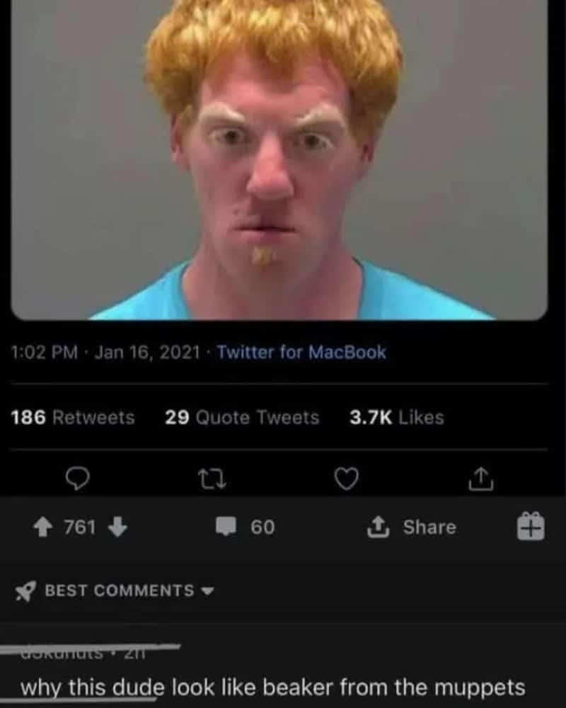 A man with red hair and a surprised expression on his face.