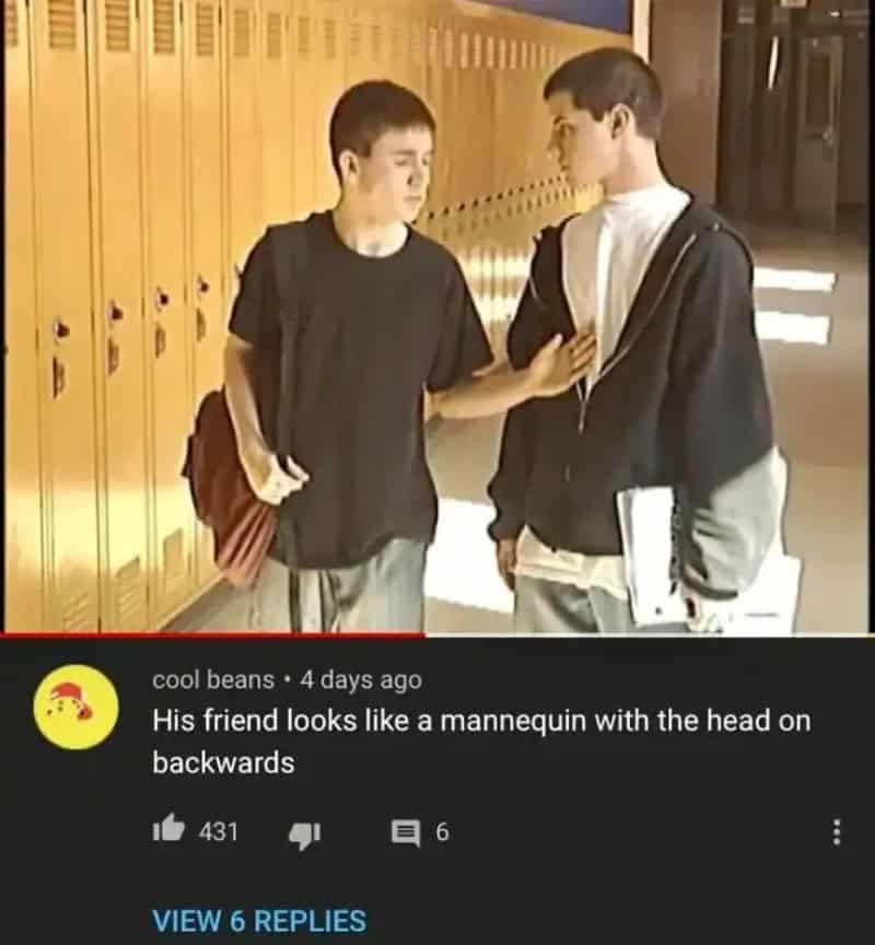 Two boys in a school hallway, one touching the other's chest, with a humorous comment.