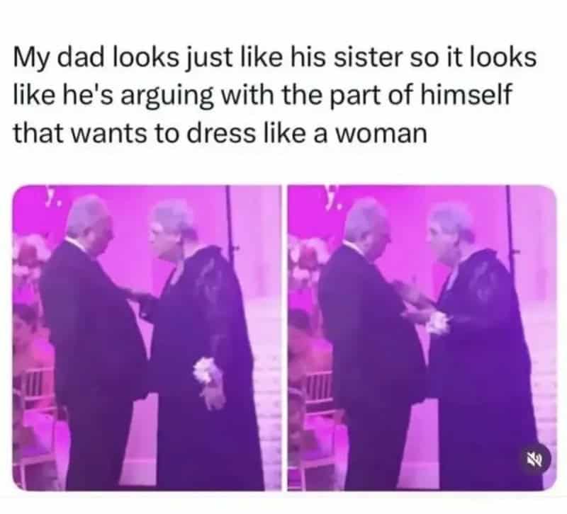 Two men in suits appear to argue at a formal event, with one handing a flower to the other.