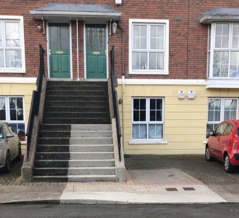 Before and after power washing of stairs and building exterior.