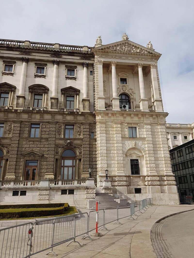 Historic building with classical architecture, columns, and ornate details.