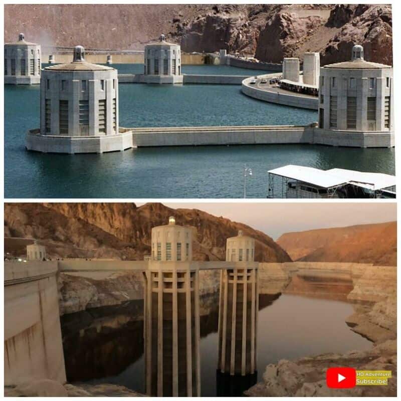 Hydroelectric dam structures on a reservoir with towers and water, scenic canyon surroundings.