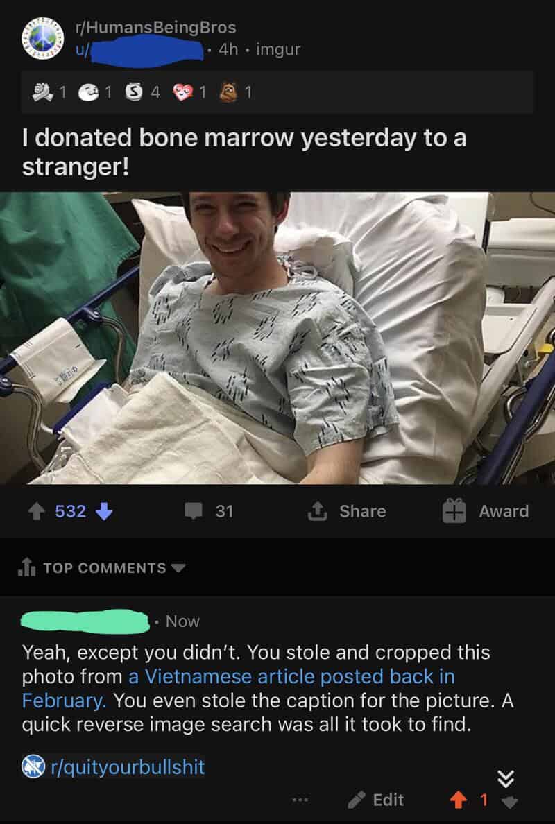 Smiling man in hospital gown holding a bone marrow donation card.