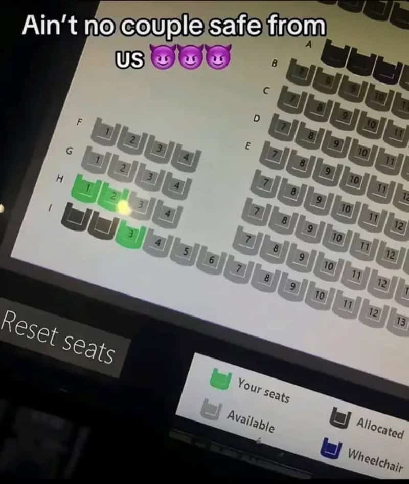 Screenshot of a seating chart with green seats labeled 1, 2, 3 and purple emojis, with text 'Ain'tno.
