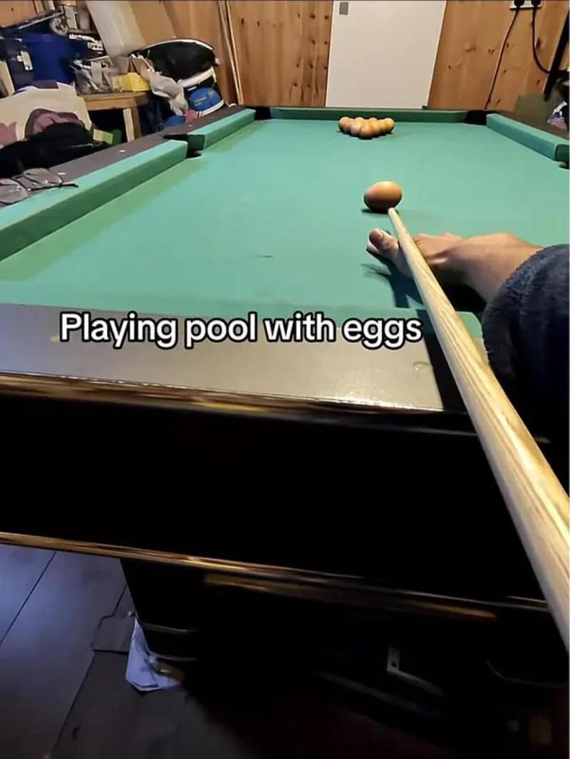 Playing pool with eggs.