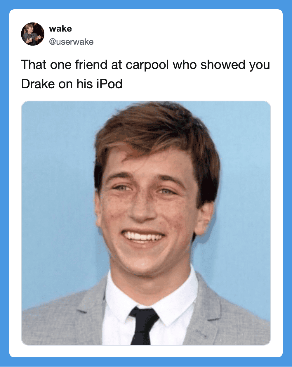 Friend at carpool showing Drake on his iPod, smiling.