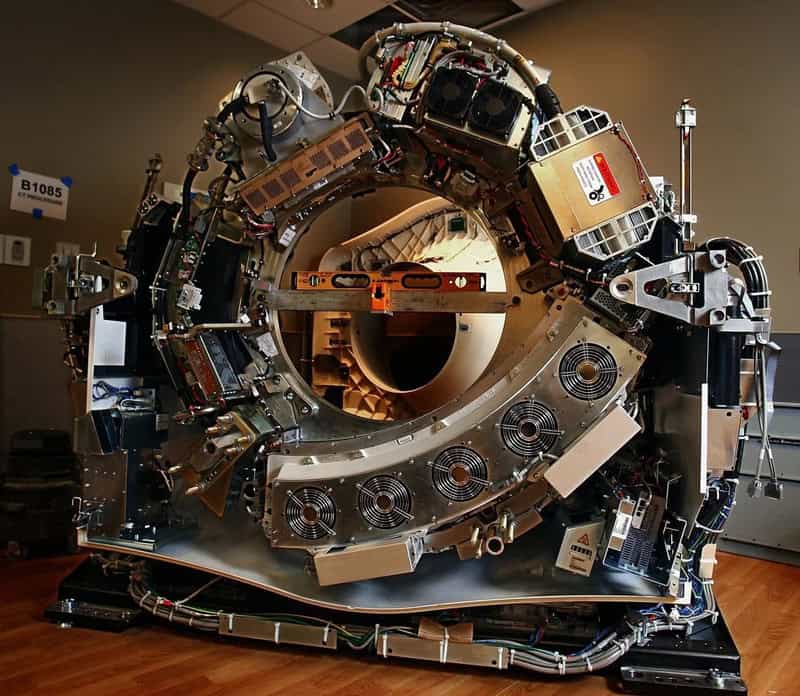 Large circular machine with various mechanical parts and electronic components.