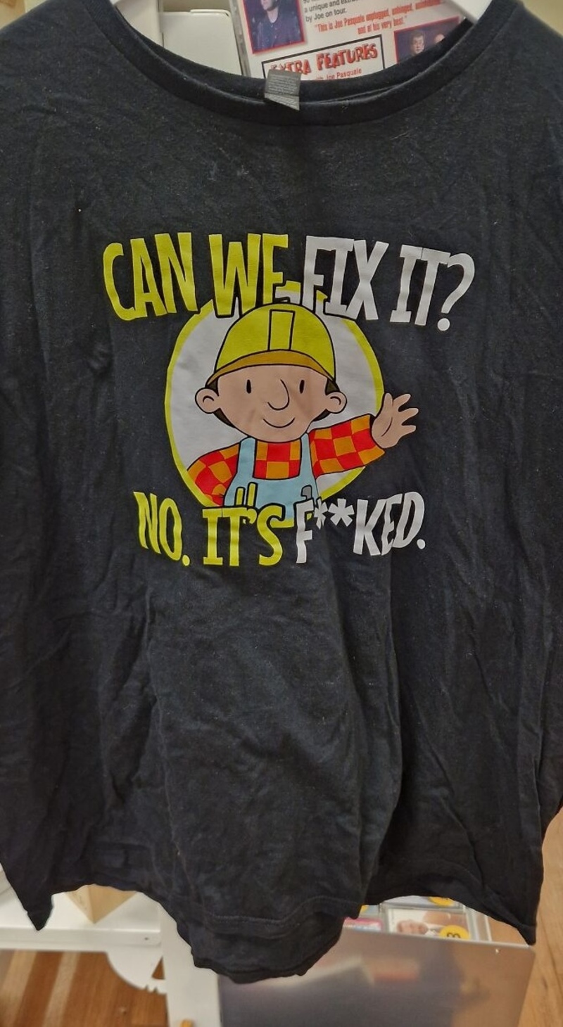 T-shirt with cartoon construction worker saying 'Can we fix it? No, it's f***ed.'.
