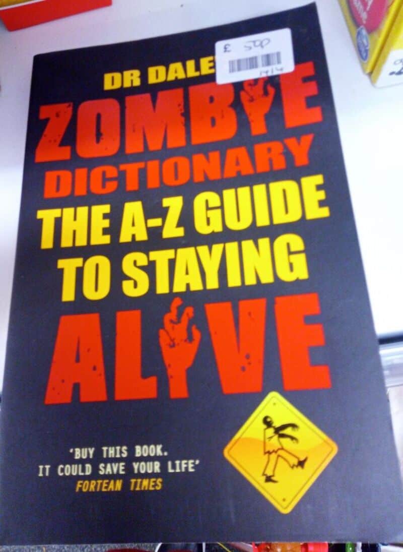 The A-Z Guide To Staying Alive book cover by Dr Dale Zombye with bold red and the.