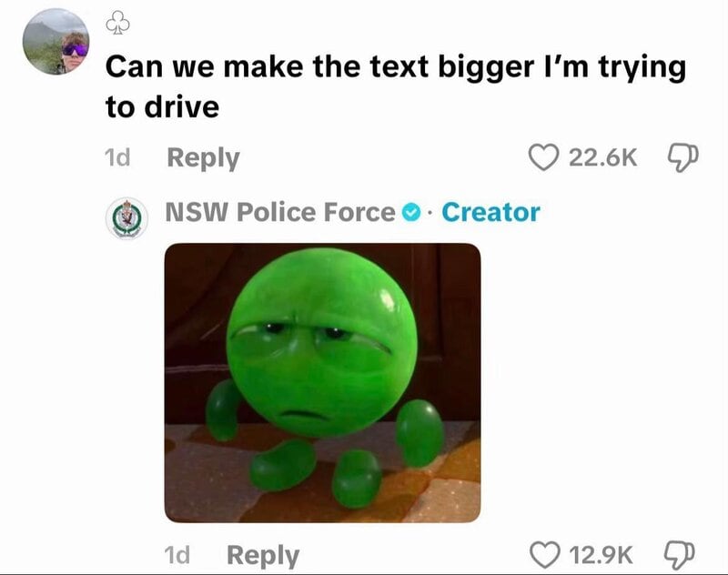 NSW Police Force reply with a green, sad, round character with arms and legs.